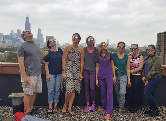 The Federle Lab watches the 2017 eclipse from the roof of our research building